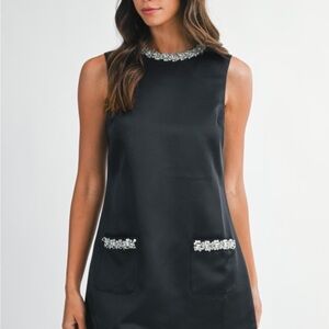 Elegant Black Sleeveless Dress with Embellishments